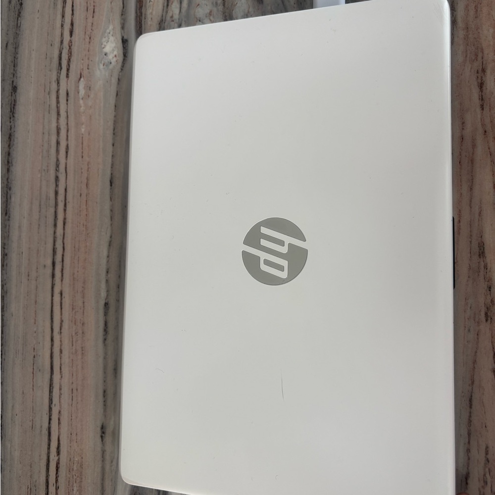HP White Laptop with Silver Logo
